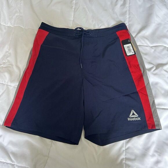 NWT Reebok Swim Trunks Mens Medium Blue Red Pull On Mesh Lining Back Zip Pocket - Picture 1 of 8